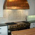 Custom Copper Range Hood over a stove